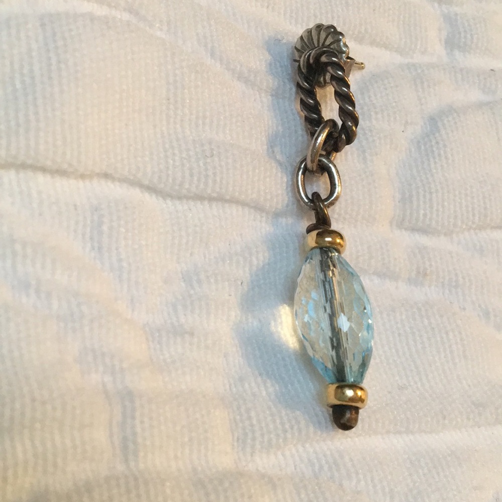 One David Yurman blue topaz dangle earring.